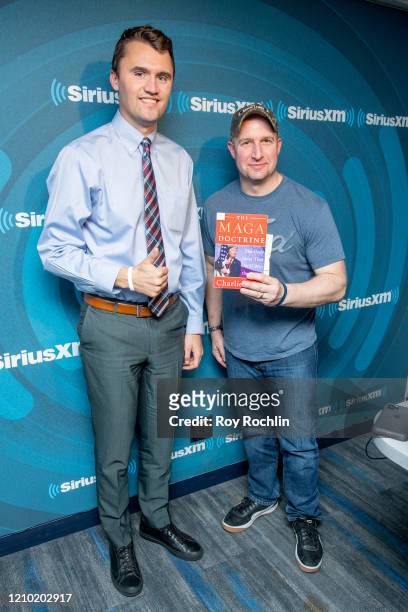 Charlie kirk and host Andrew Wilkow as he visits SiriusXM Studios on March 03, 2020 in New York City.