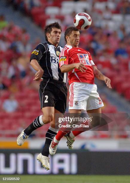 Patacas of Nacional da Madeira and Simao Sabrosa of Benfica in action during the third round of a Portuguese League game between Nacional da Madeira...