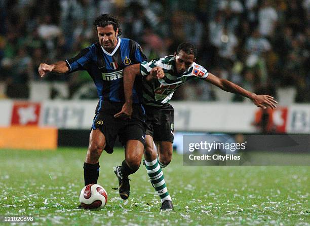 Luis Figo, left, playing with Inter Milan and Liedson, of Sporting, during the 100th anniversary match between Sporting Lisbon and Inter Milan in...