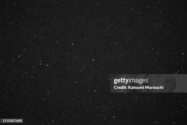 silver foil black paper texture background - black snow stock pictures, royalty-free photos & images