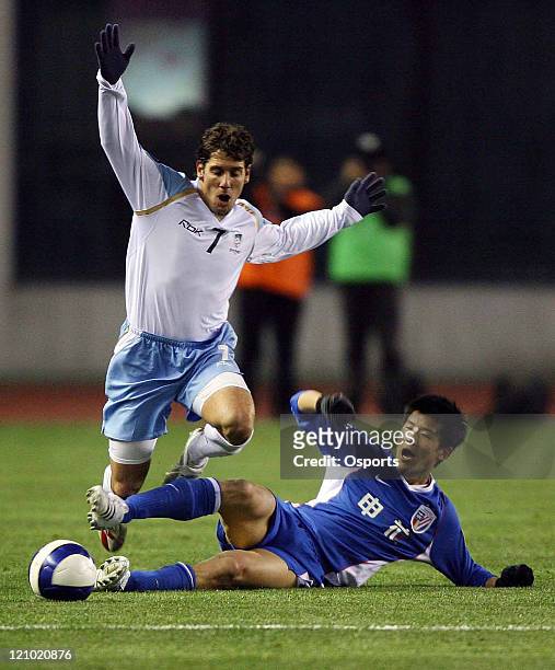 Middleby Robert of Sydney FC is tackled during the AFC Champions League 2007 match between the Sydney FC of Australia and Shanghai Shenhua of China...