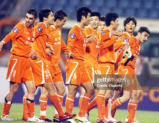 Shandong Luneng celebrates after a Group G AFC Champions League match between Shandong Luneng and Seongnam Ilhwa in Jinan, China on March 21, 2007....