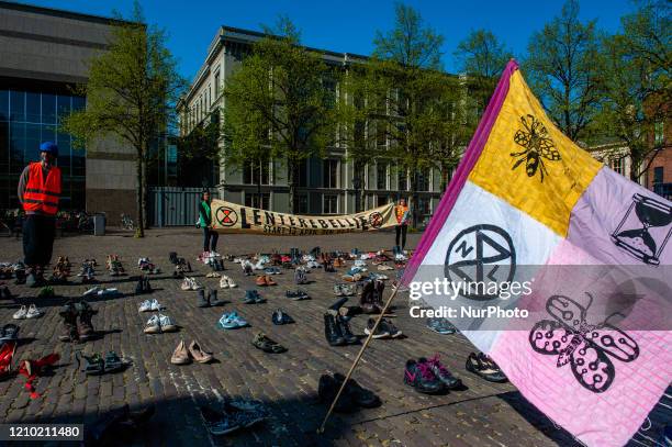 More than a thousand of shoes has been placed in front of the House of Representatives, during the symbolic action carried out by the climate...