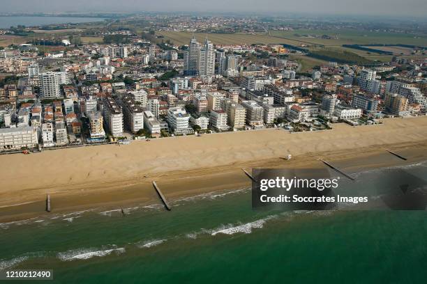 An aerial view from a helicopter of the deserted Jesolo beach during the Covid-19 lockdown aimed at curbing the spread of the coronavirus on April...