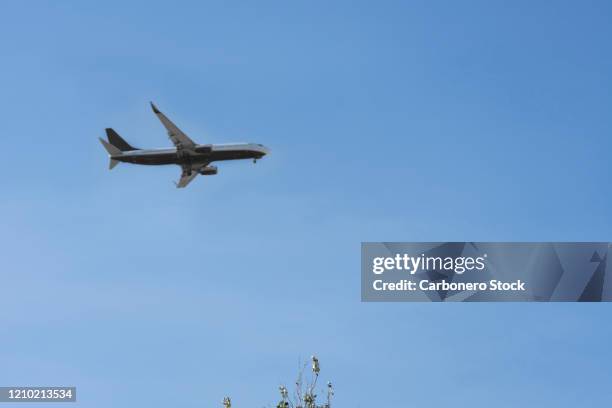 aeroplane flying. - hovering stock pictures, royalty-free photos & images