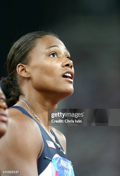 Marion Jones reacts after the United States gets a DNF in the Women's 4x100m Relay Final in Olympic Stadium at the Athens 2004 Olympic Games in...