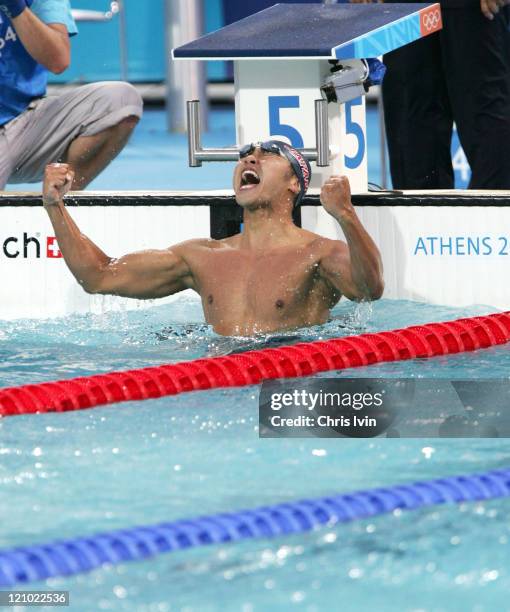 Kosuke Kitajima wins the Men's 100-meter Breaststroke Final in a time of 1:00.08 at the Athens Olympics.