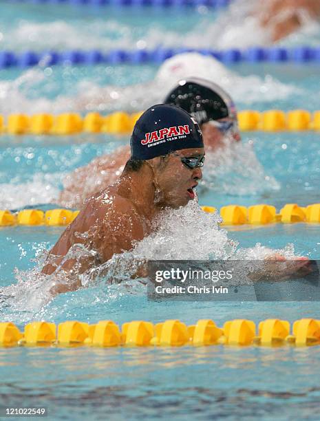 Kosuke Kitajima wins the Men's 100-meter Breaststroke Final in a time of 1:00.08 at the Athens Olympics.