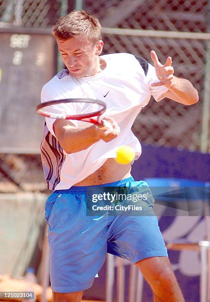 Michal Przysiezny in action against Nicolas Lapentti during the first round of the 17th Estoril Tennis Open, May 2, 2006. Held in Lisbon, Portugal.