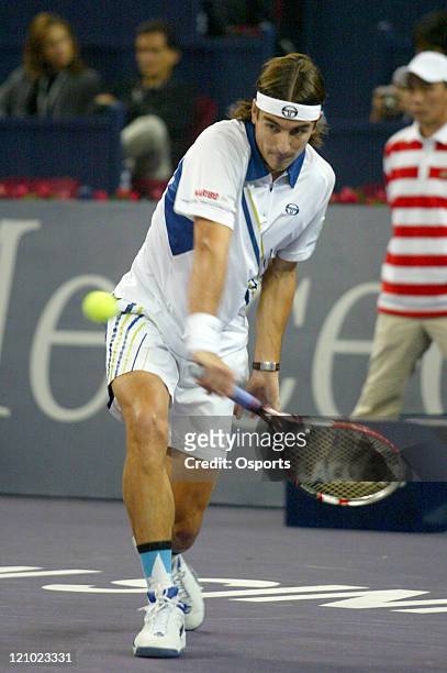 Tommy Robredo in action during his day two match with Nikolay Davydenko, Shanghai Tennis Masters Cup in Shanghai on November 13, 2006.