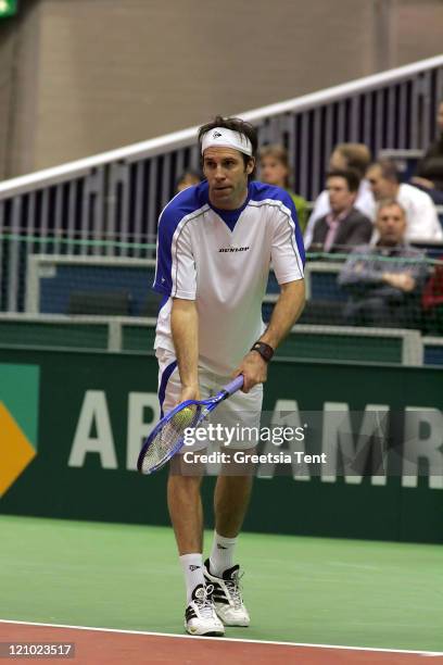 Greg Rusedski in action against Nikolay Davydenko during their second round match during the ABN AMRO World Tennis Tournament at the Ahoy' in...