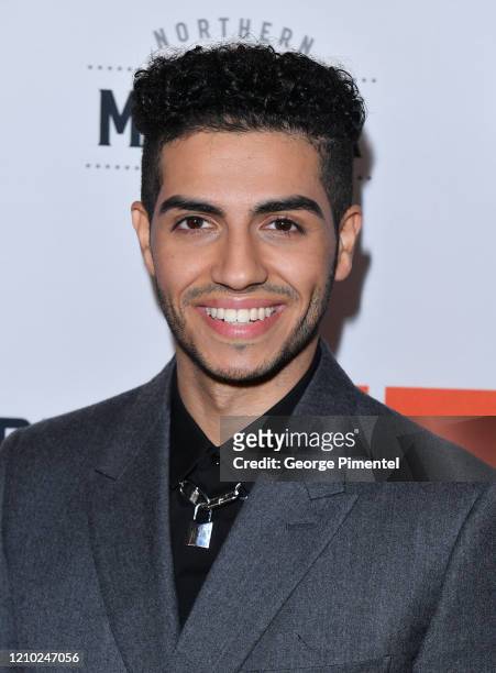 Mena Massoud attends the Canadian Premiere of "Run This Town" held at Northern Maverick Brewing Co on March 03, 2020 in Toronto, Canada.