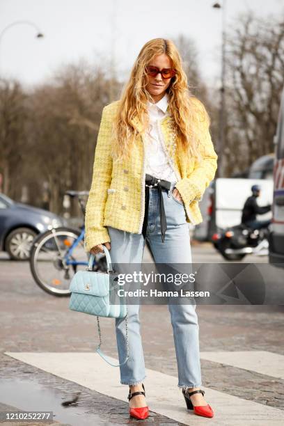 Blanca Miro wearing Chanel yellow tweed jacket, blue Chanel bag outside Paris Fashion Week Womenswear Fall/Winter 2020/2021 Day Nine on March 03,...