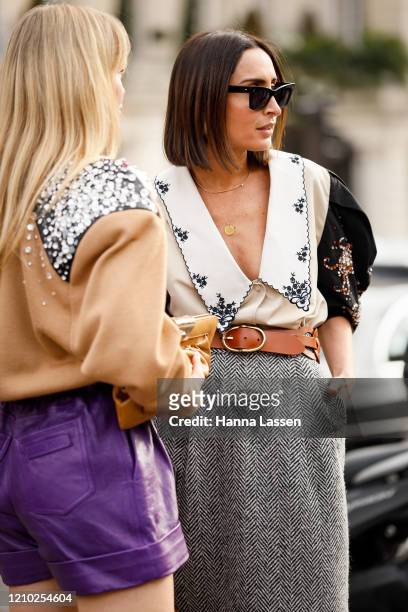 Jeanette Madsen and Geraldine Boublil wearing Miu Miu embroidery blouse and beaded cardigan outside the Miu Miu show during Paris Fashion Week...