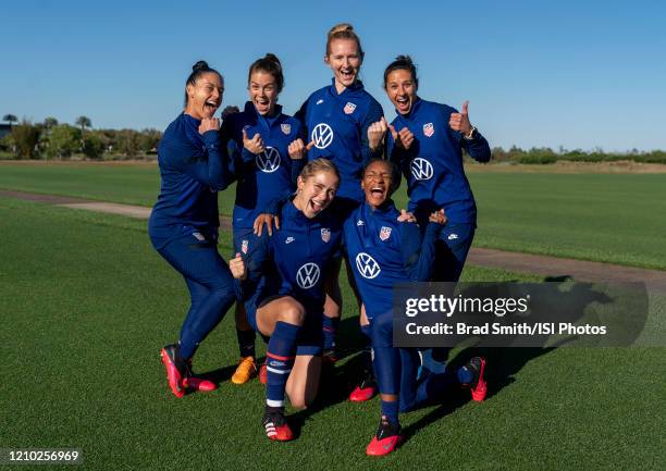 Ali Krieger, Kelley O"u2019Hara, Sam Mewis, Carli Lloyd, Abby Dahlkemper and Crystal Dunn of the United States pose at training fields on February...