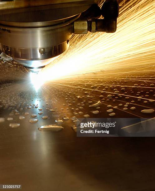 water cooled laser cutter - laser cutting stock pictures, royalty-free photos & images