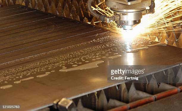water-cooled laser metal cutting head - laser cutting stock pictures, royalty-free photos & images