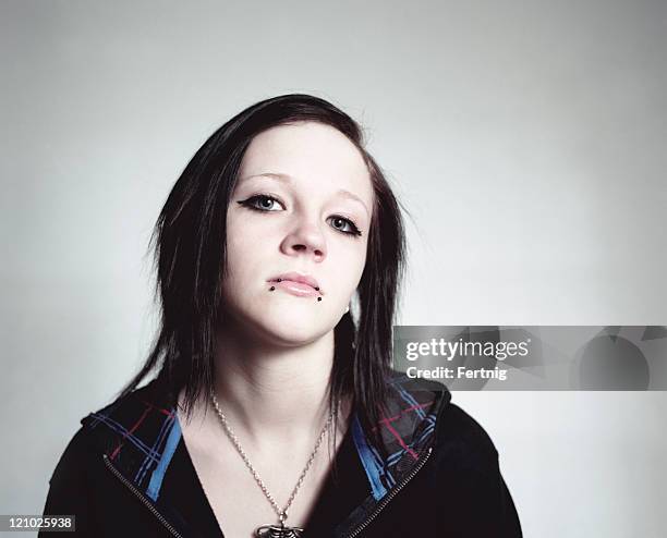 teenaged girl with piercings - emo girl stock pictures, royalty-free photos & images