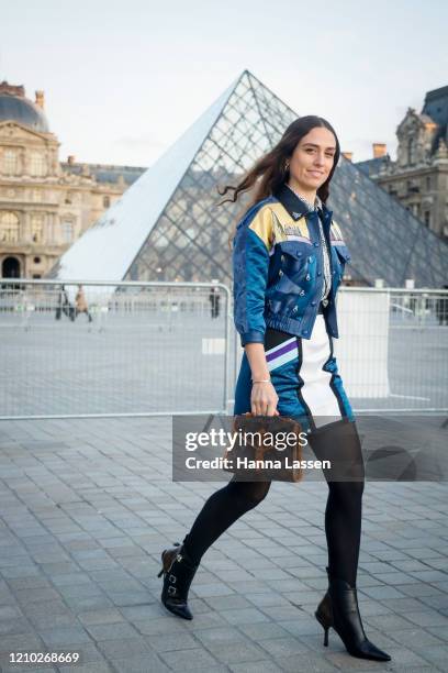 Erika Boldrin wearing Louis Vuitton blue leather jacket, bag and pointy ankle boots outside the Louis Vuitton show during Paris Fashion Week...