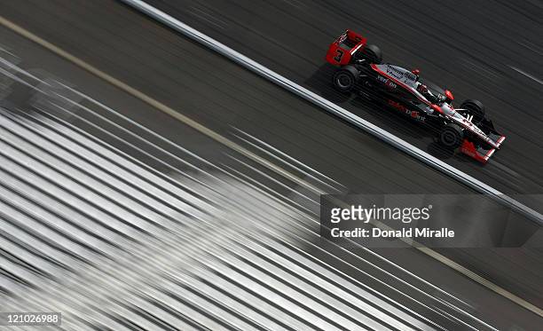 Helio Castroneves of Brazil drives the Guidepoint Systems Team Penske Dallara Honda on track during practice for the IZOD IndyCar Series...