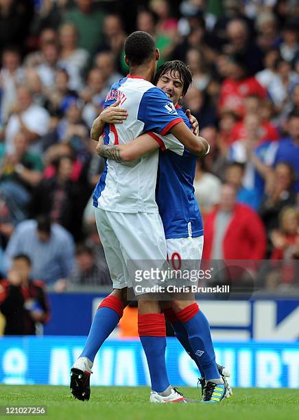 Mauro Formica of Blackburn Rovers celebrates scoring the opening goal with team-mate Steven Nzonzi during the Barclays Premier League match between...