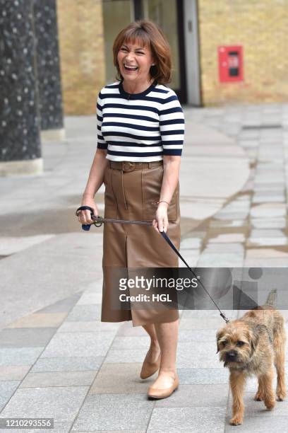 Lorraine Kelly seen walking her dog Angus on March 04, 2020 in London, England.
