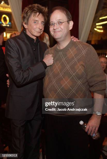 Writer and producer Marc Cherry and singer-songwriter Barry Manilow pose at Mon Ami Gabi French Bistro at the Paris Las Vegas on March 27, 2010 in...