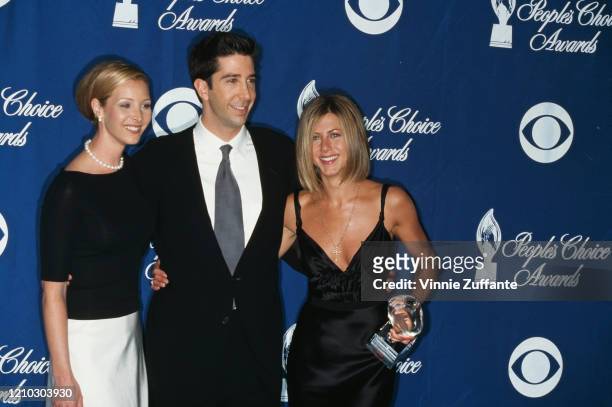 American actors Lisa Kudrow, David Schwimmer, and Jennifer Aniston attend the 27th Annual People's Choice Awards at the Pasadena Civic Auditorium in...