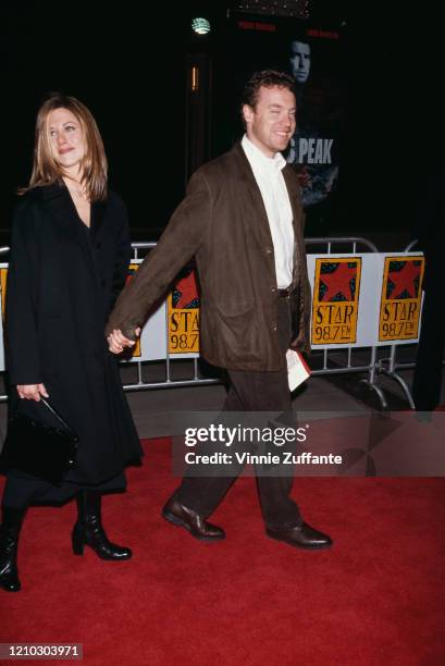 American actress Jennifer Aniston and American actor Tate Donovan attend the "Dante's Peak" premiere at Universal Amphitheatre in Universal City,...