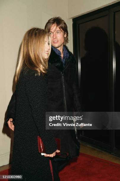 American actors Jennifer Aniston and Brad Pitt attend the premiere of "Hanging Up" at Mann's Bruin Theater in Westwood, California, US, 16th February...