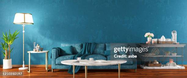 panoramic blue modern living room - velvet couch stock pictures, royalty-free photos & images