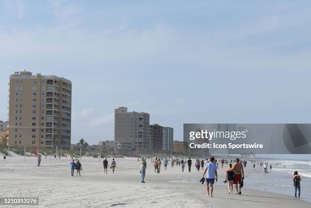 People crowded the beaches in its first open hour on April 17, 2020 in Jacksonville Beach, Fl. Jacksonville Mayor Lenny Curry opened the beaches to...