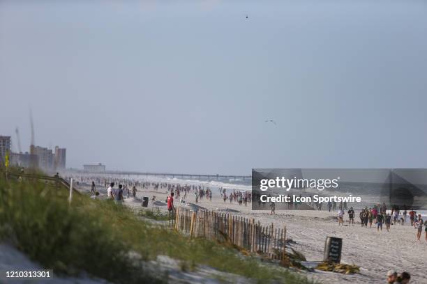 People crowded the beaches in its first open hour on April 17, 2020 in Jacksonville Beach, Fl. Jacksonville Mayor Lenny Curry opened the beaches to...