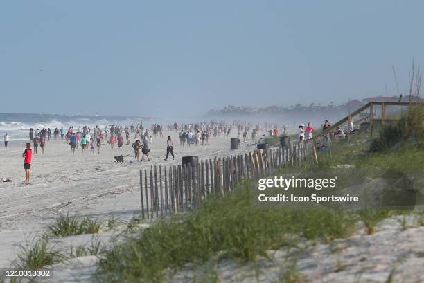 People crowded the beaches in its first open hour on April 17, 2020 in Jacksonville Beach, Fl. Jacksonville Mayor Lenny Curry opened the beaches to...