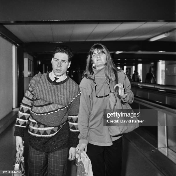David Armstrong Jones, Viscount Linley, and British socialite Susannah Constantine at Heathrow Airport in London, England, 17th February 1985.