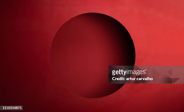red studio background - rosso foto e immagini stock