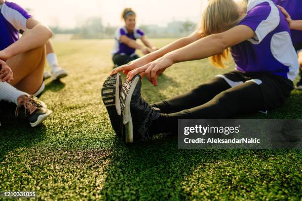 preparation for the soccer match - warming up stock pictures, royalty-free photos & images