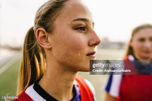 teenage girl, soccer player, on a court - sweaty girl stock pictures, royalty-free photos & images