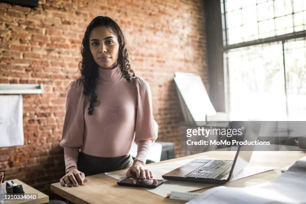 Portrait of businesswoman in architect's office