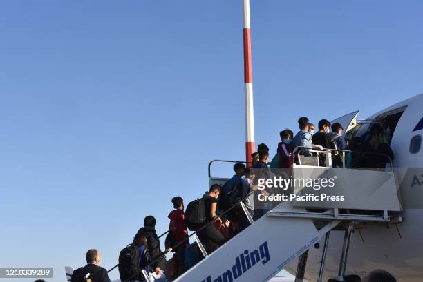 Unaccompanied underage refugees that are boarding to the plane to Germany. At the "Eleftherios Venizelos" airport, during the departure of 50...