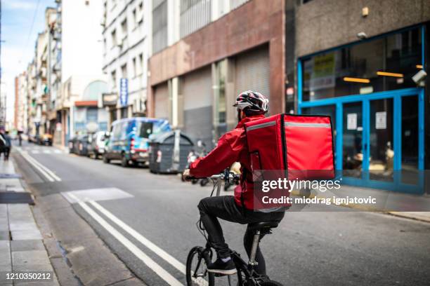 food delivery on bycicle - buenos aires food stock pictures, royalty-free photos & images