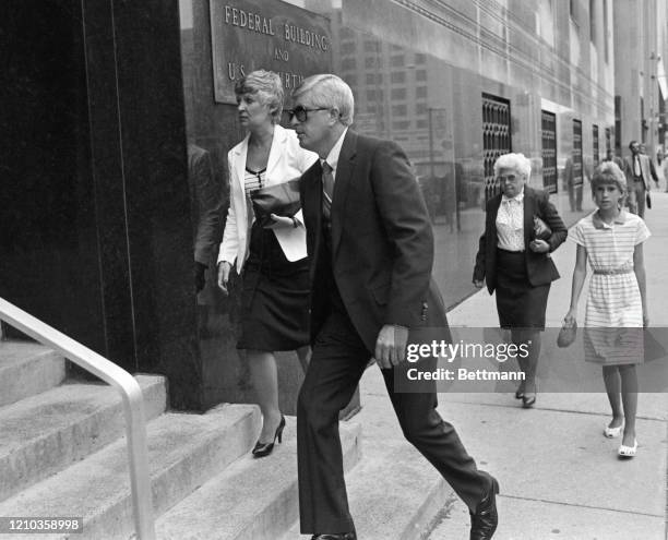 Ronald Ebens, one of the men accused of beating Vincent Chin to death, is seen here accompanied by an unidentified woman as he enters federal court....