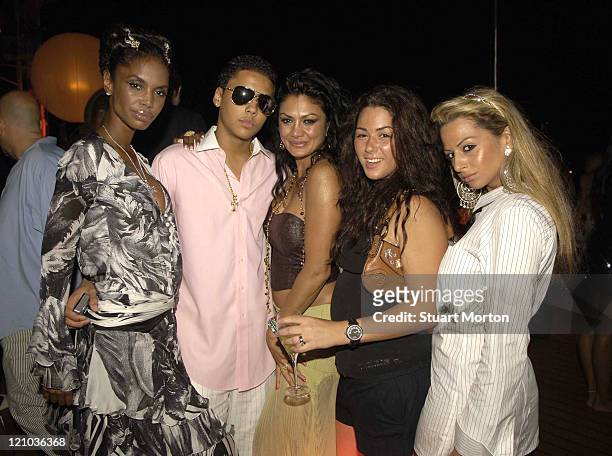 Kim Porter, Quincy Combs and guests during "Unforgivable" Fragrance Celebration - Dinner - St. Tropez - France in St Tropez, France.