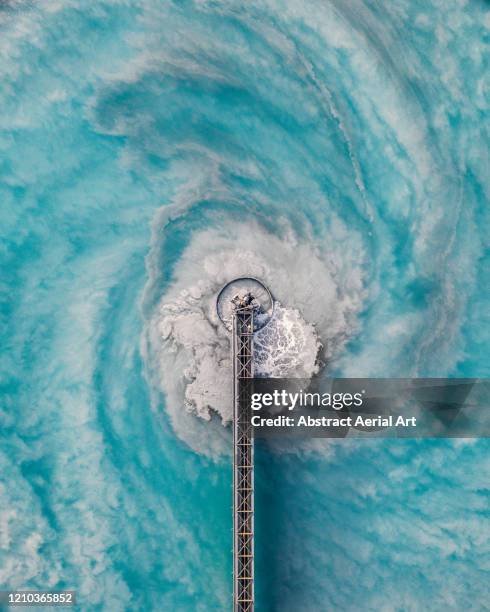 aerial image showing swirling water patterns at a waste management facility, arizona, united states of america - wasser industrie stock-fotos und bilder