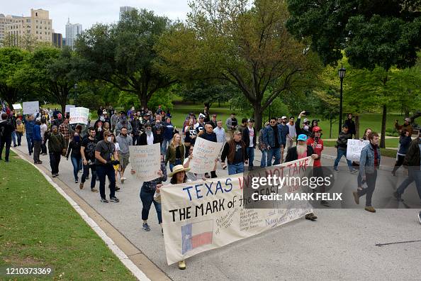 Reopen Protesters Protesters march during the