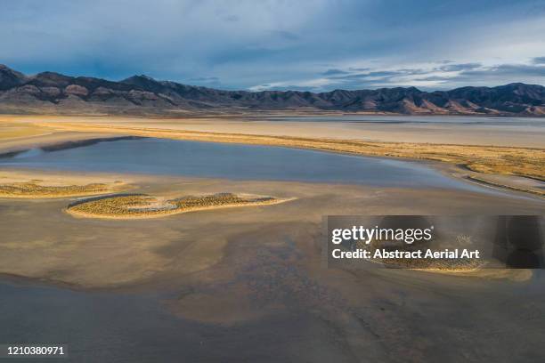 aerial shot of distant mountains, utah, united states of america - great salt lake stock pictures, royalty-free photos & images