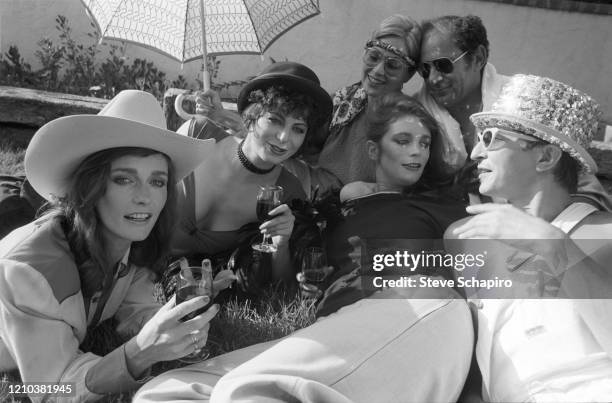 Portrait of Canadian-American actress Margot Kidder , her sister, fellow actress Annie , and unidentified others, Malibu, California, 1970s or 1980s.