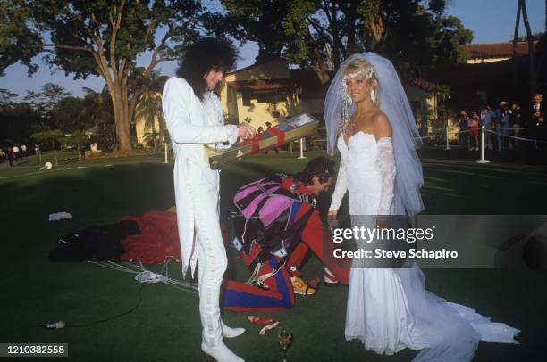 View of American Tommy Lee and actress Heather Locklear and musician during their wedding at the Santa Barbara Biltmore, Santa Barbara, California,...