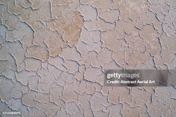 arid surface photographed by drone, california, united states of america - lehm mineral stock-fotos und bilder