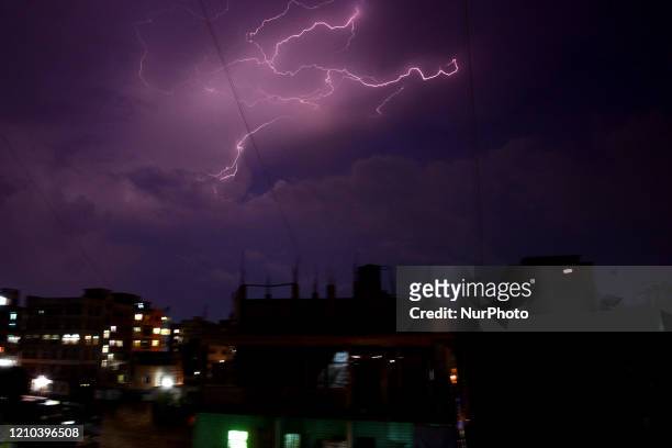 Lightning flashes in the sky over the Dhaka City during a storm in Bangladesh, on April 19, 2020
